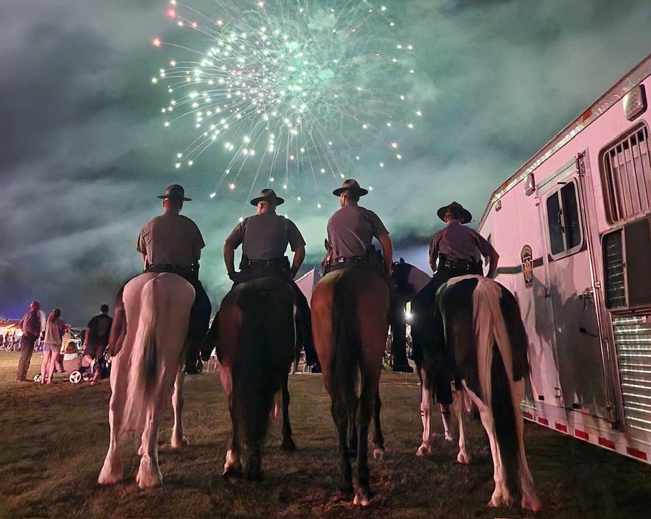 Mounted officers and fireworks